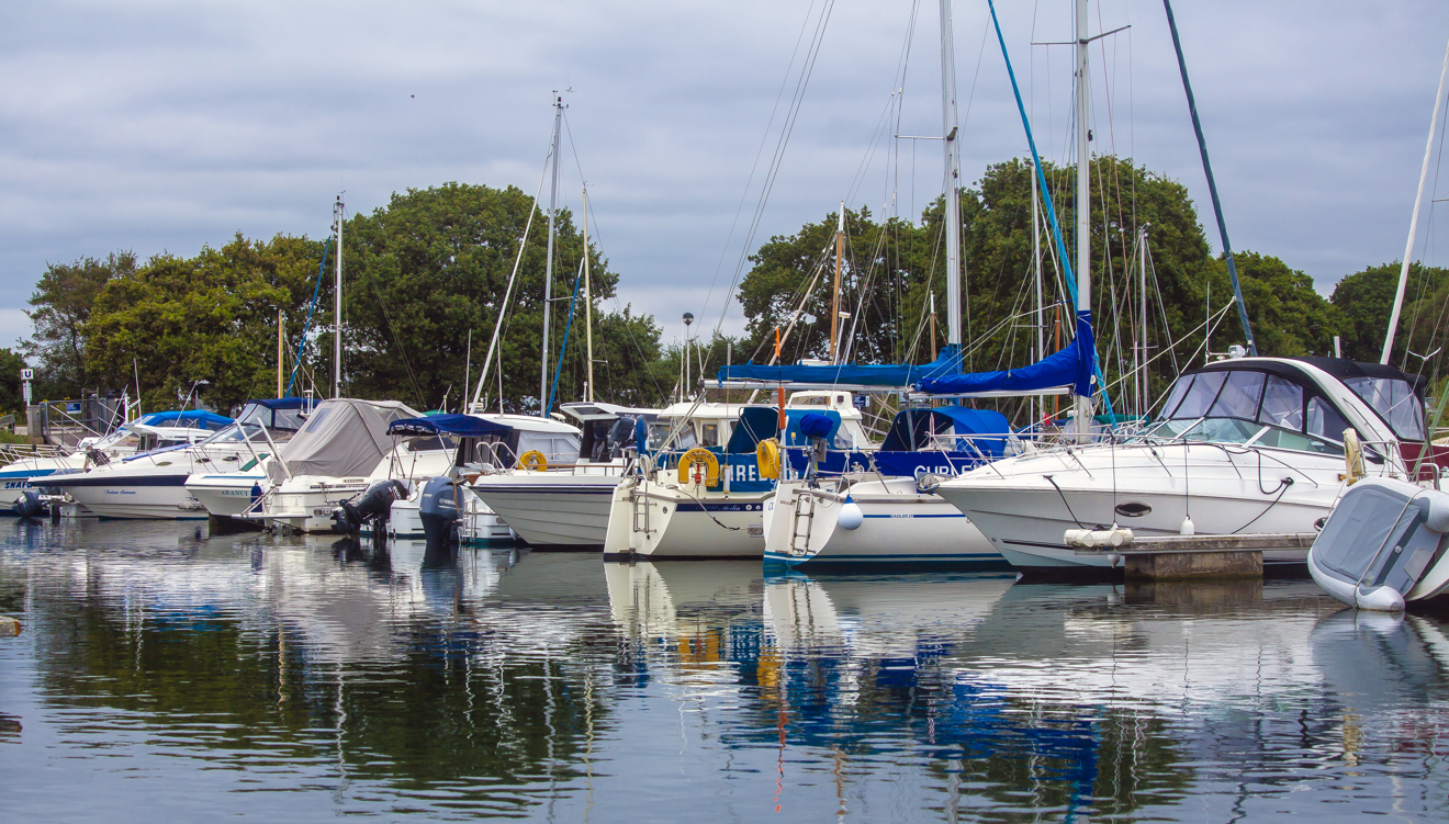 Boats moored next to each other 