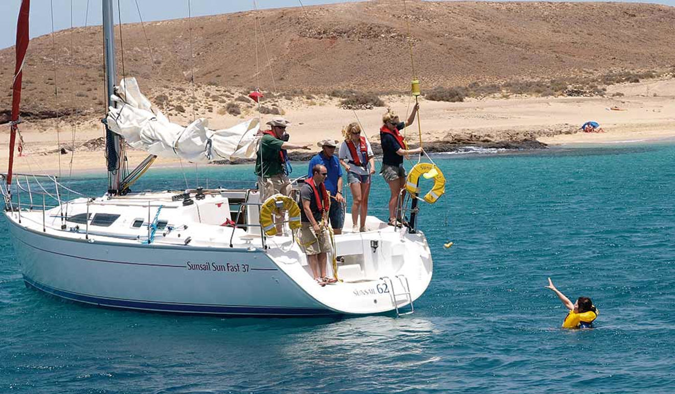 Crew rescuing a man overboard