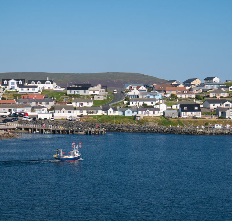 The coastal community of Hamnavoe on the west of Mainland, Shetland, Scotland, UK 