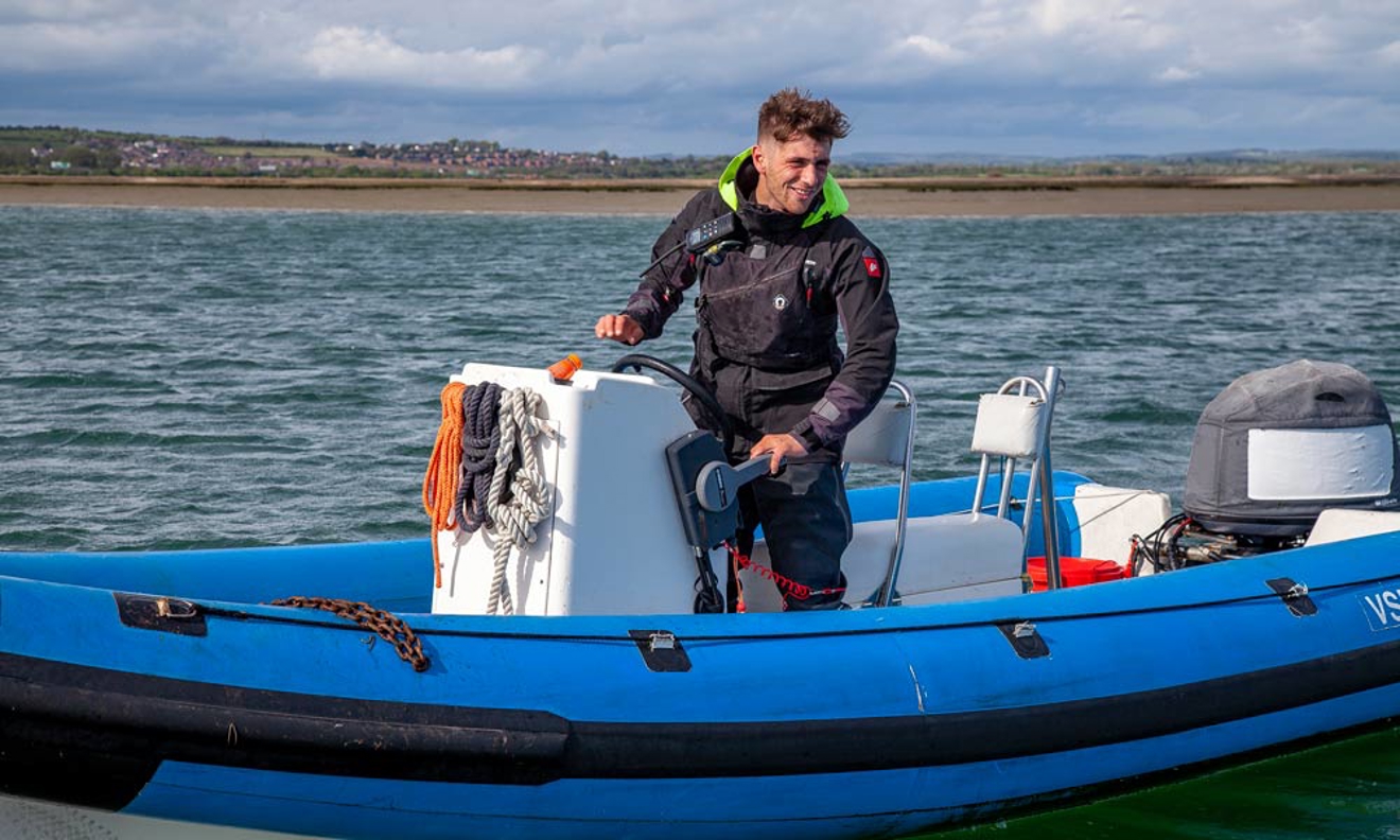	Kieron standing on a RIB