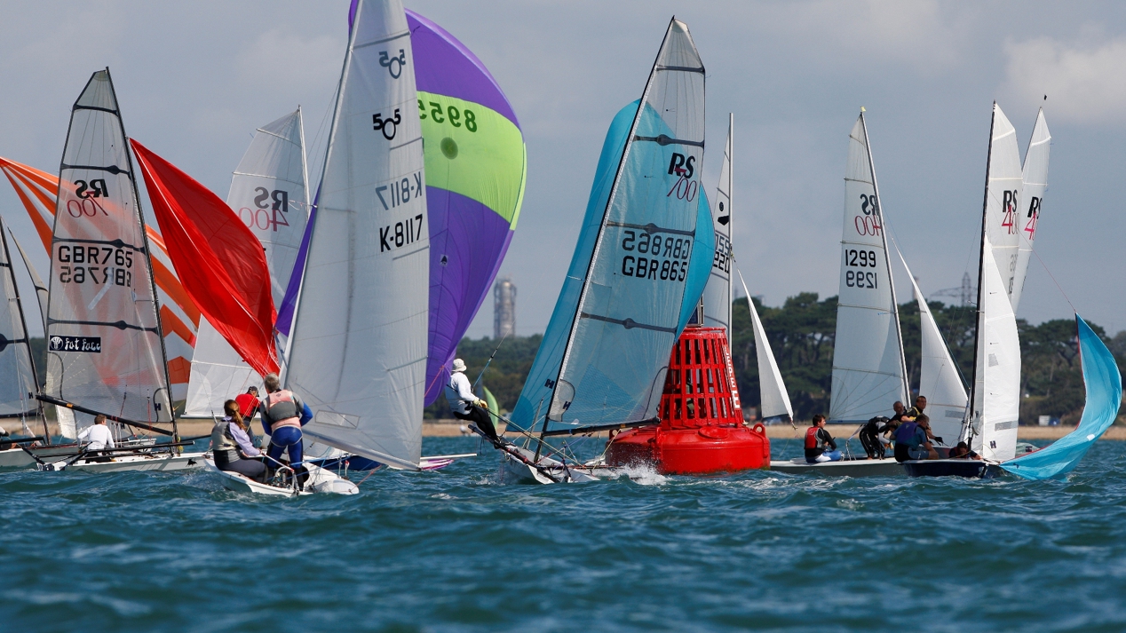 Dinghy Fleet Racing At Mark