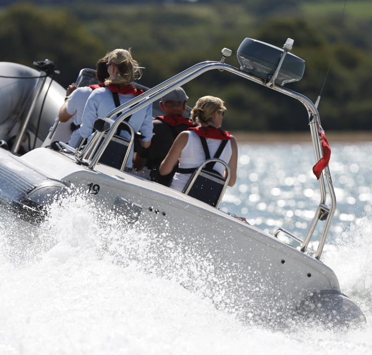 Powerboat bow lifted upwards with speed 