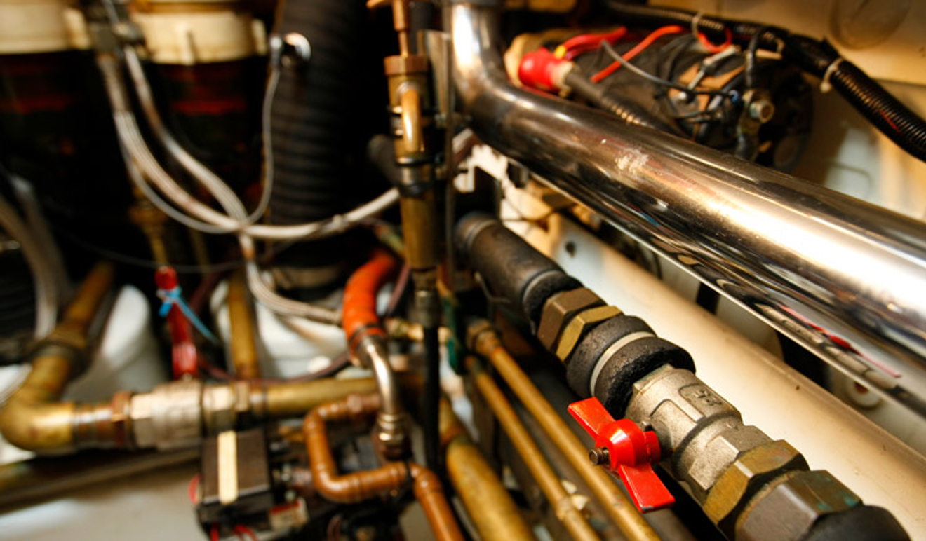 Pipes and mechanisms within a boat engine