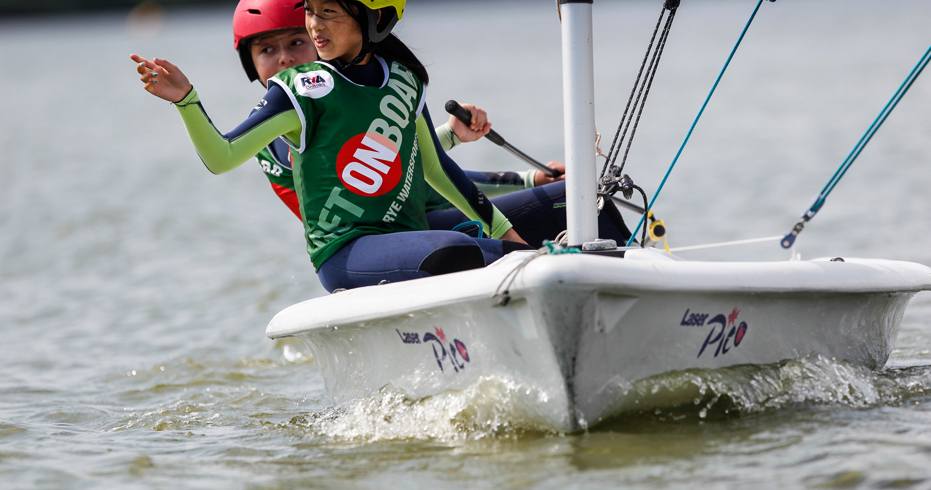 Two young sailors in a dinghy 