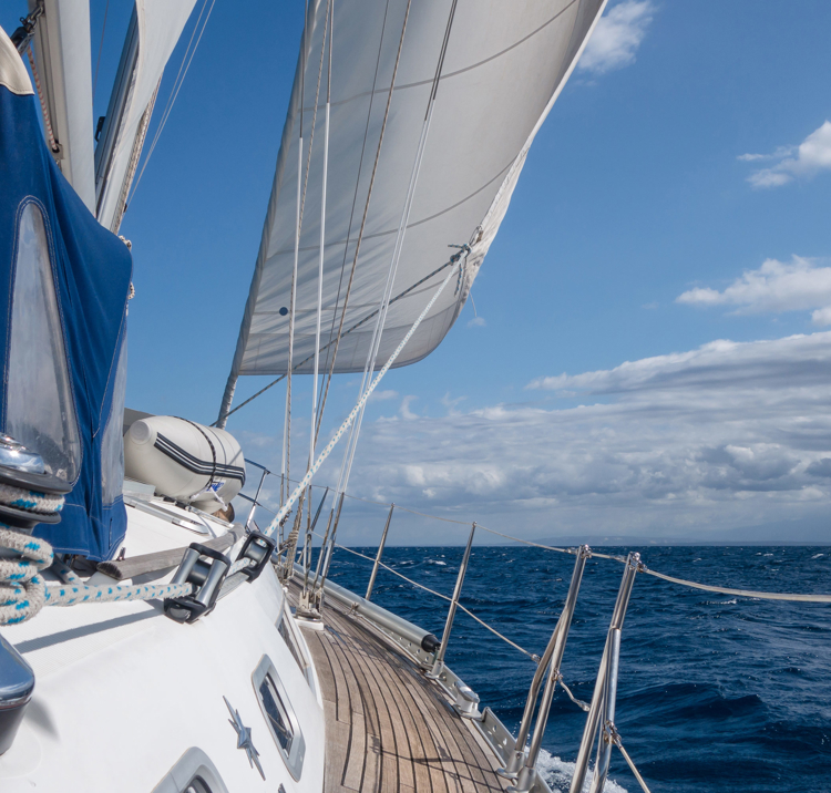 Mid shot of boat edge sailing safely 