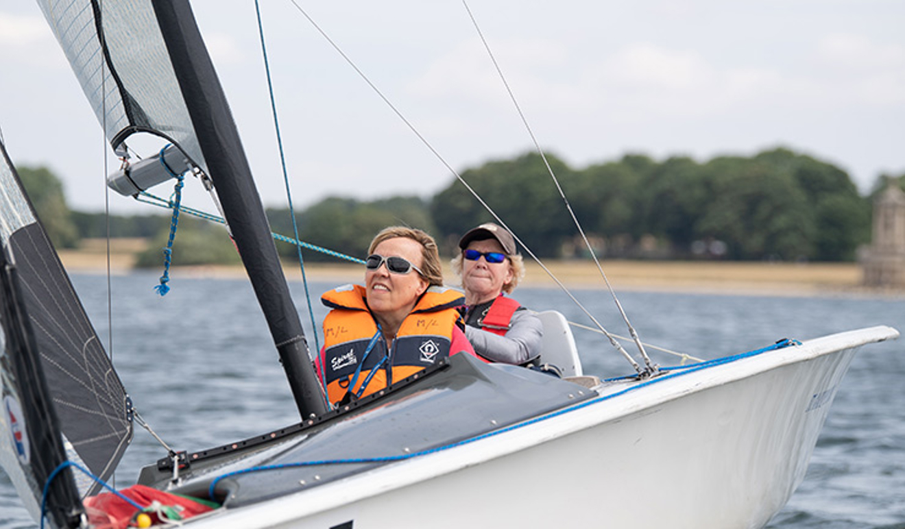 Sarah and another lady sailing in a dinghy