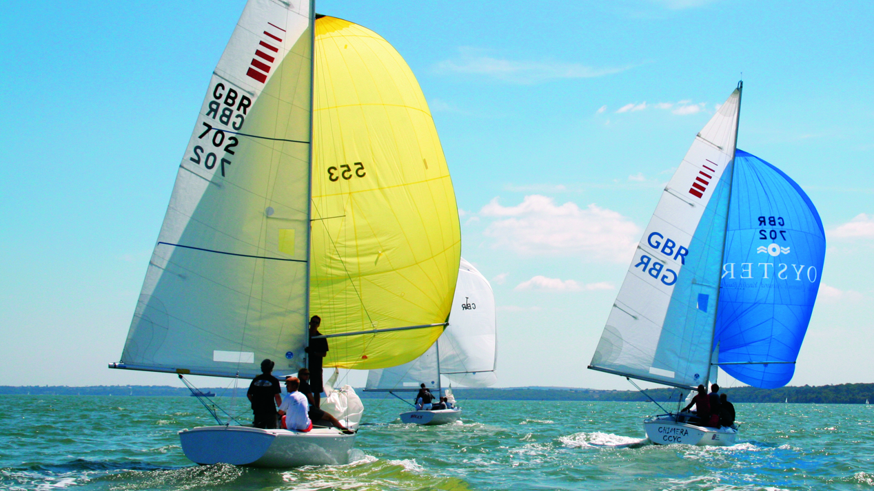 Dinghy users enjoying dinghy sailing course