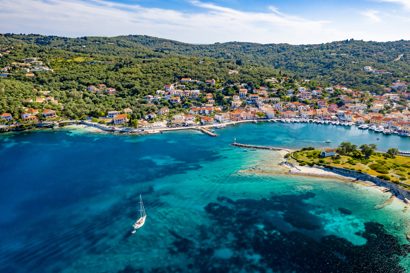 High shot of the med showing a harbour and a yacht in the ocean