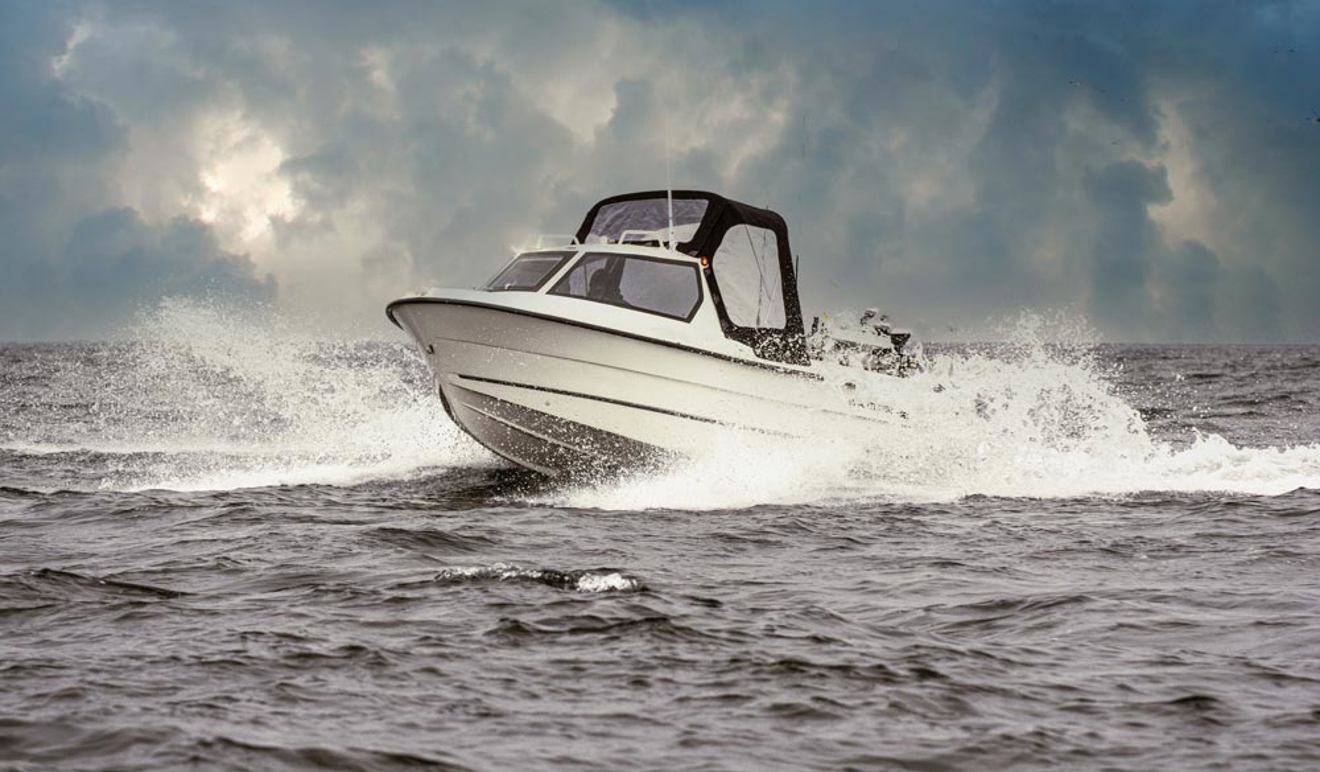 Powerboat creating a large spray of water
