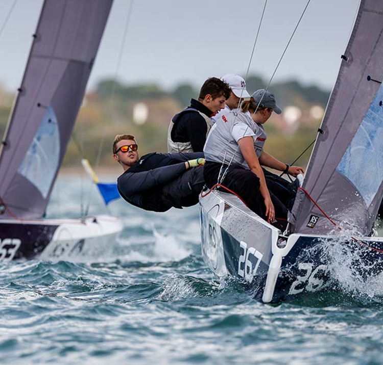 close up of numerous dinghies racing