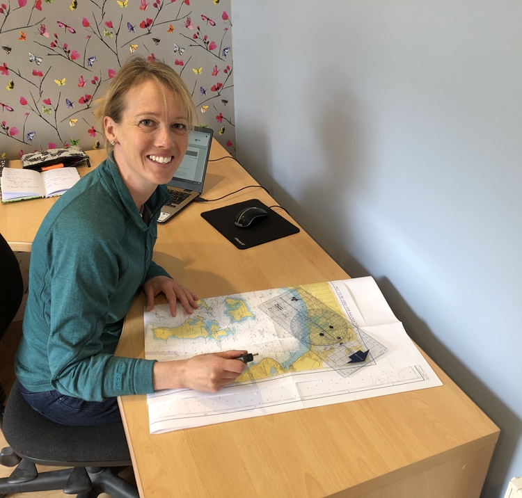 Above shot of Emma Fletcher preparing for her Elearning course 