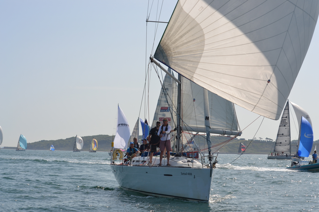 Yacht travelling along sparkling waters